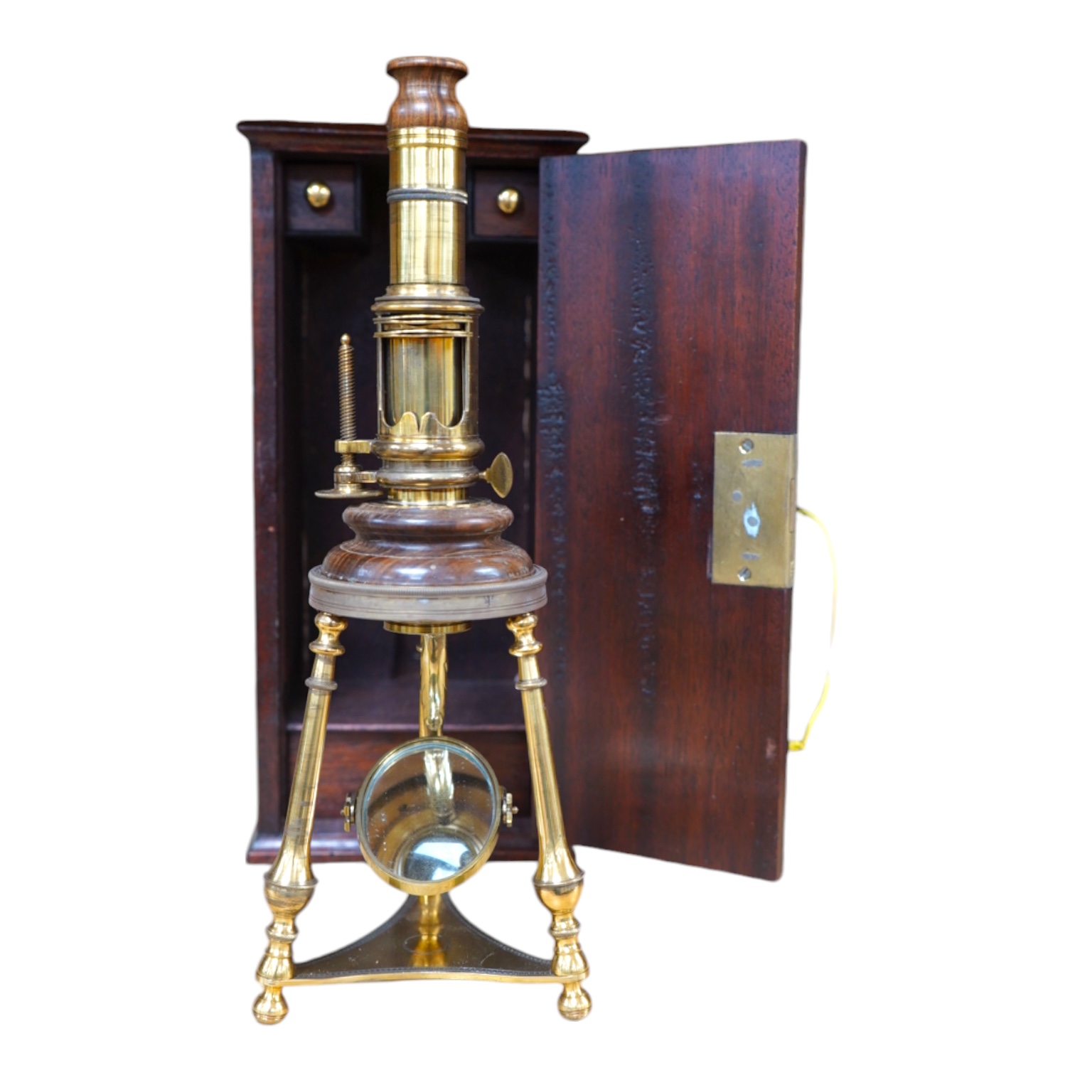 A cased reproduction W.R. Feat 18th century Culpeper style brass microscope, 20cm high, spare lenses in drawer of case. Condition - good.